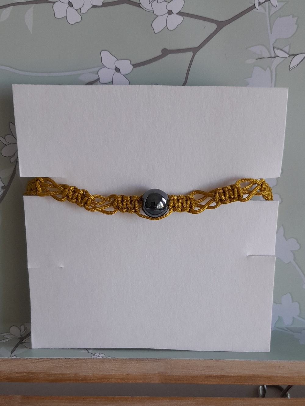 Gold Macramé Bracelet with Hematite Accent